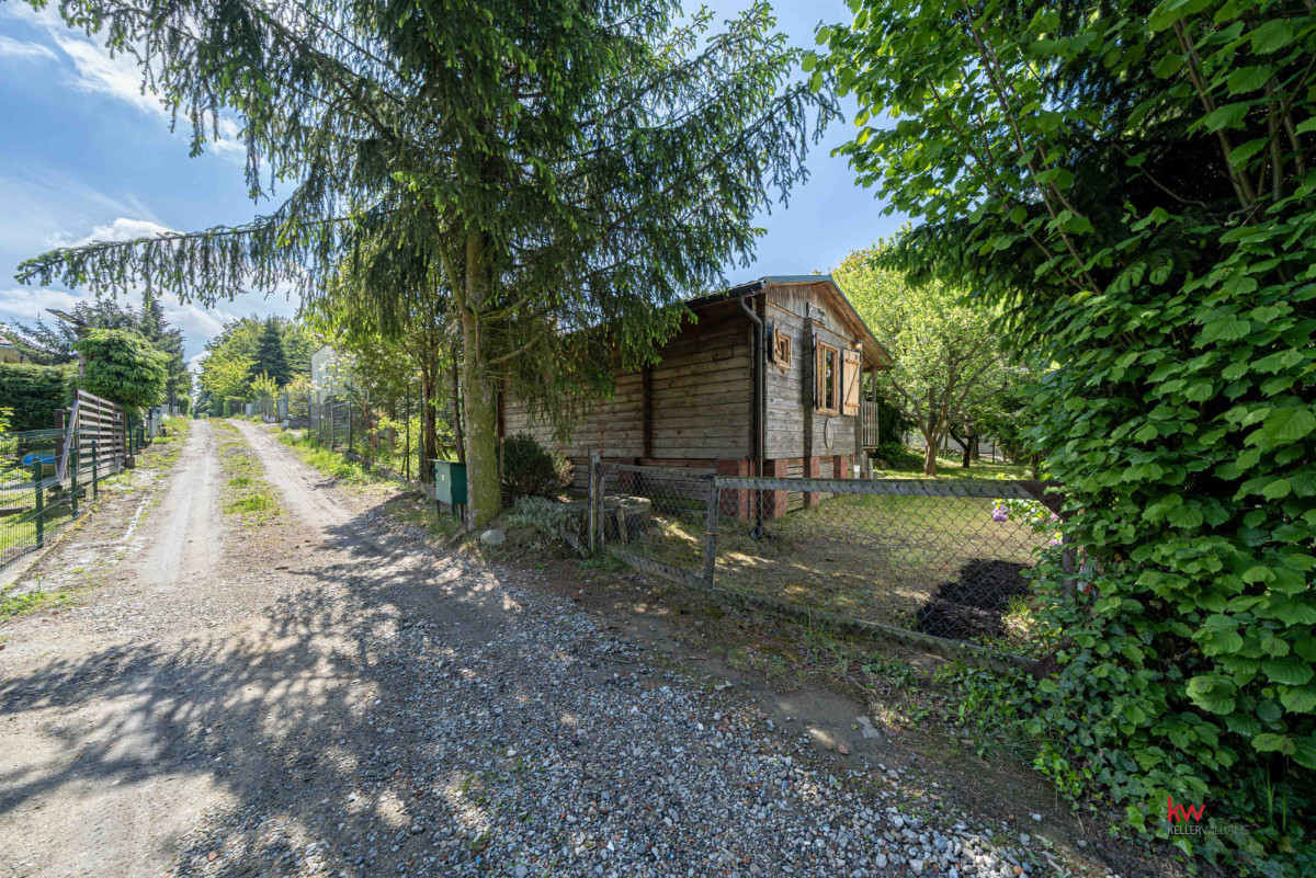 108088031 Urokliwa działka ROD 362 m², domek bieszczadzkiki